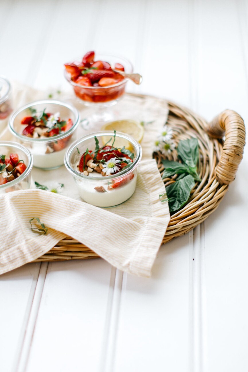 vanilla panna cotta with strawberries on tray