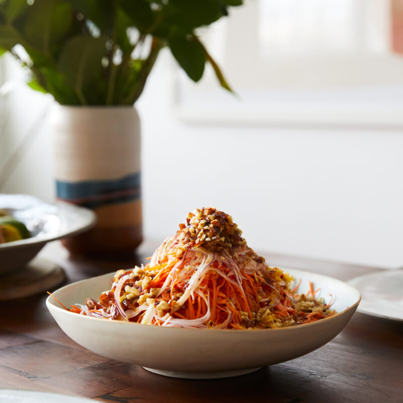 raw carrot salad with dates walnuts and aleppo