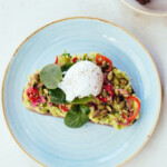 smashed avocado toast two hands NYC