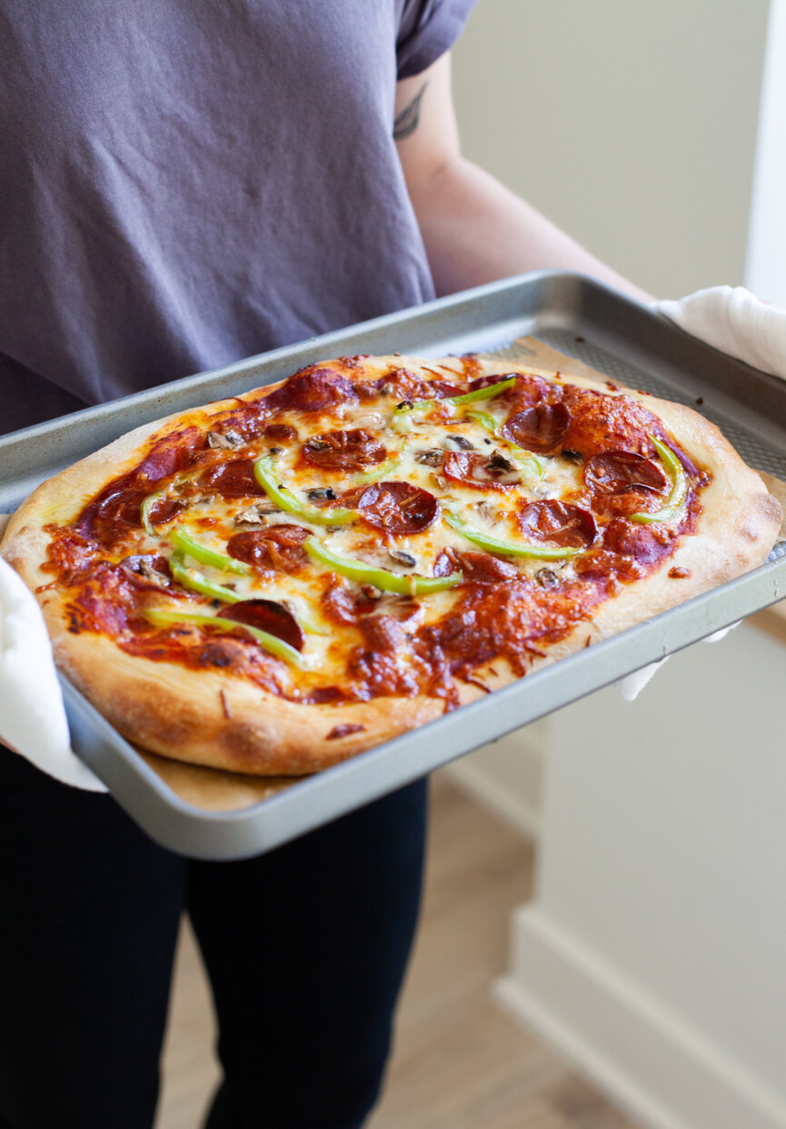 holding sheet pan pizza