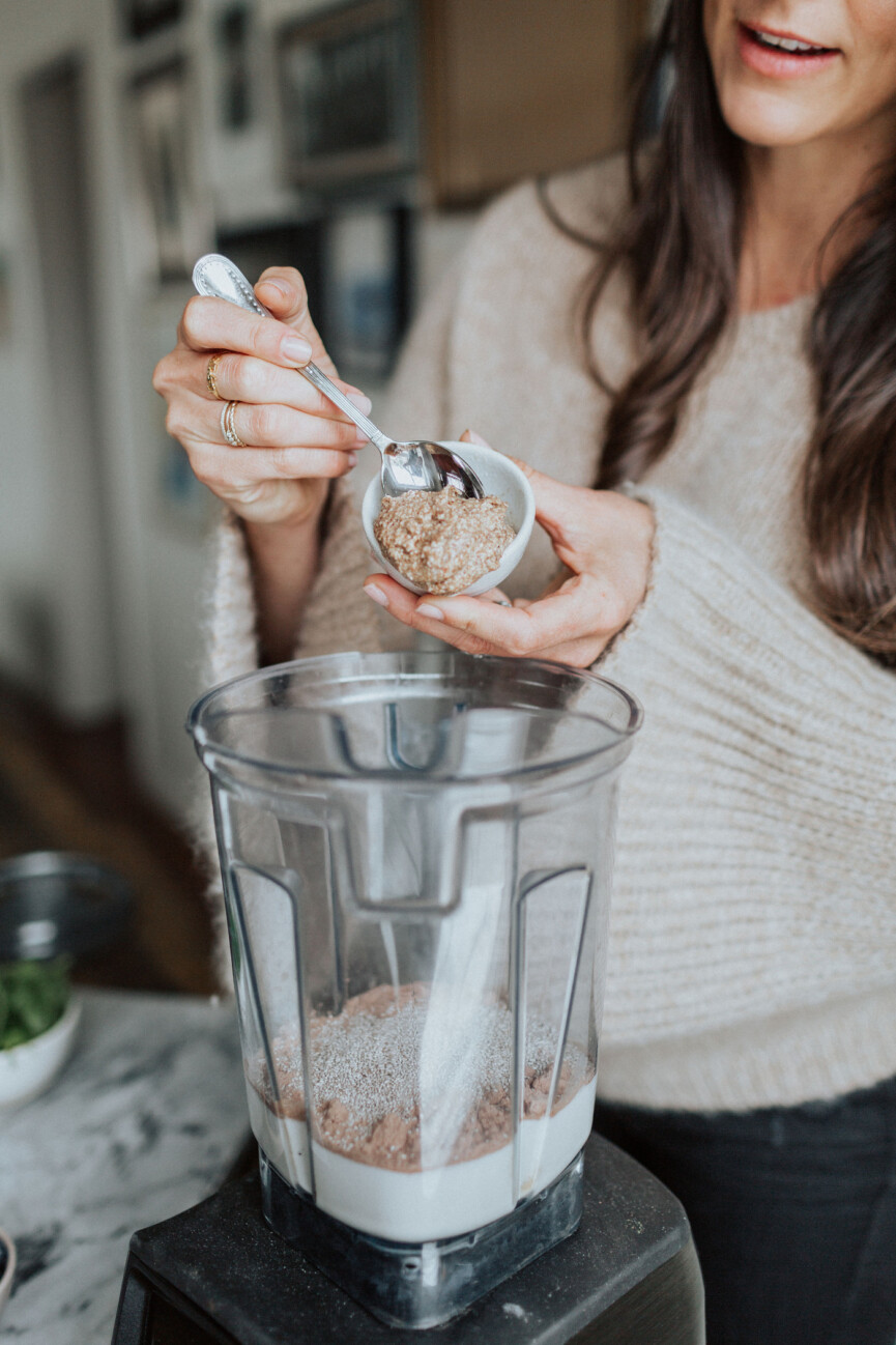 Kelly LeVeque making protein smoothie