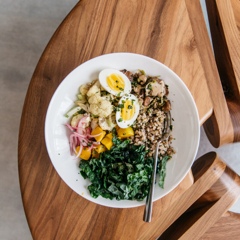 warm farro bowl with roasted cauliflower and kale