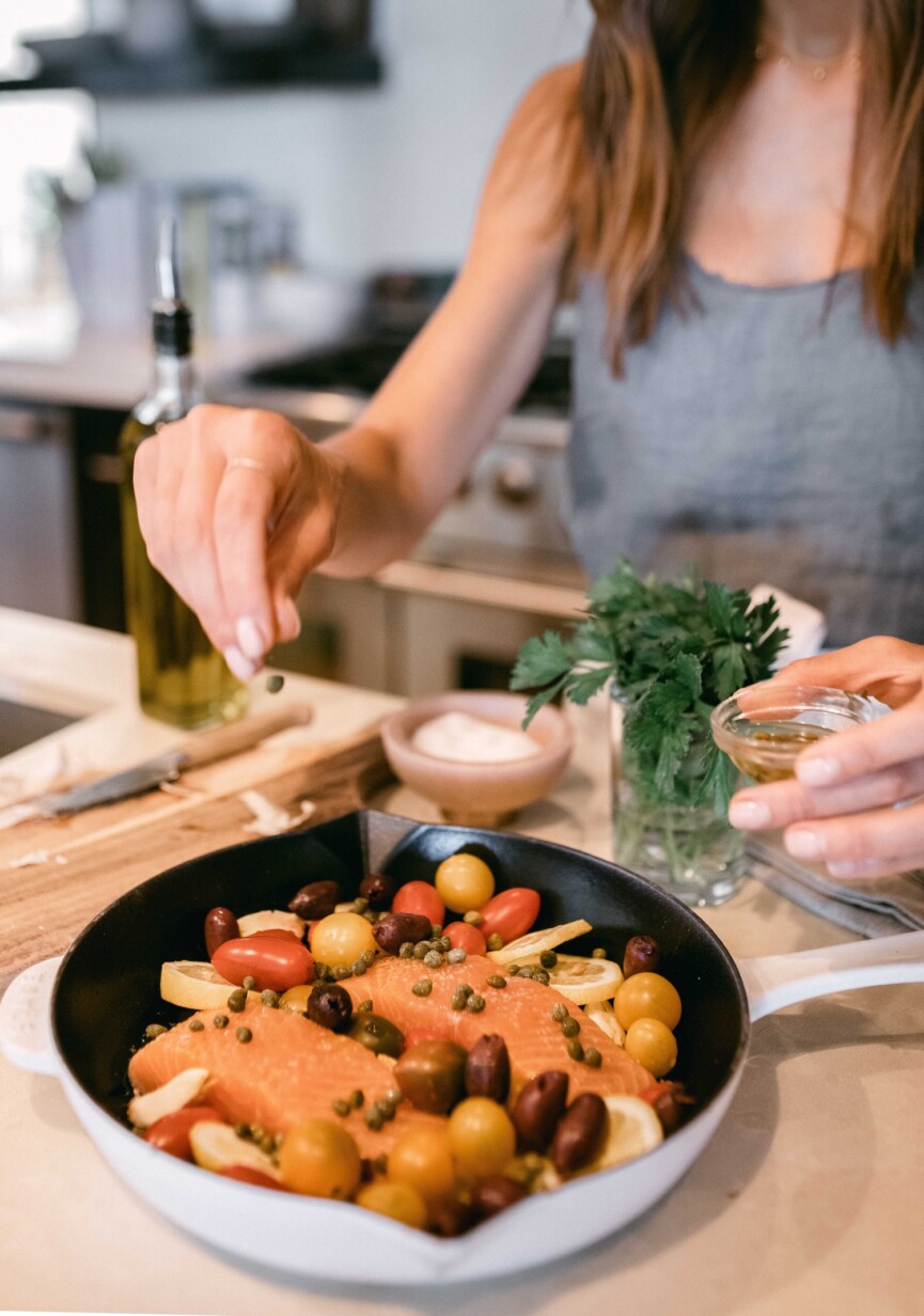 mediterranean baked salmon in cast iron pan