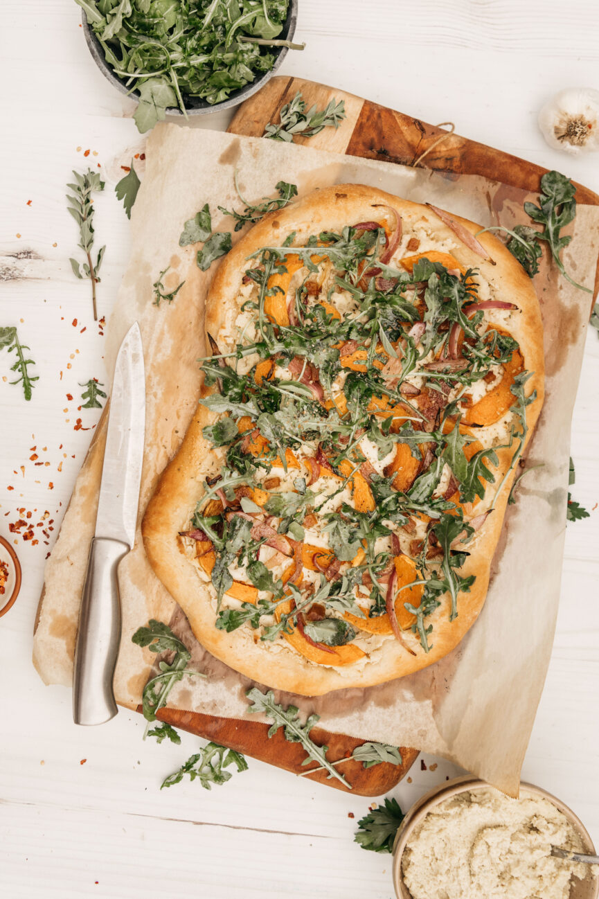 butternut squash flatbread with arugula and almond ricotta