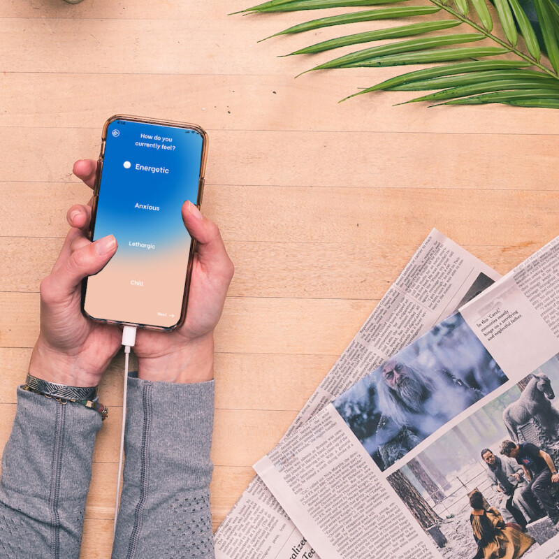 headphones, spiritune music app, phone