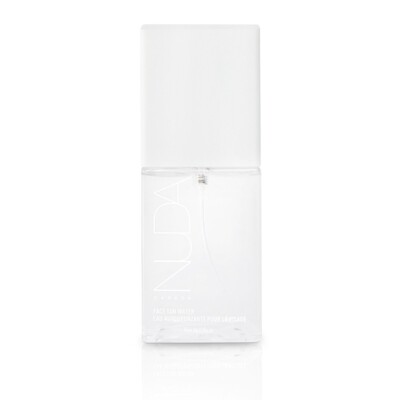 nuda face tan water