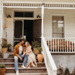 Couple smiling on front porch