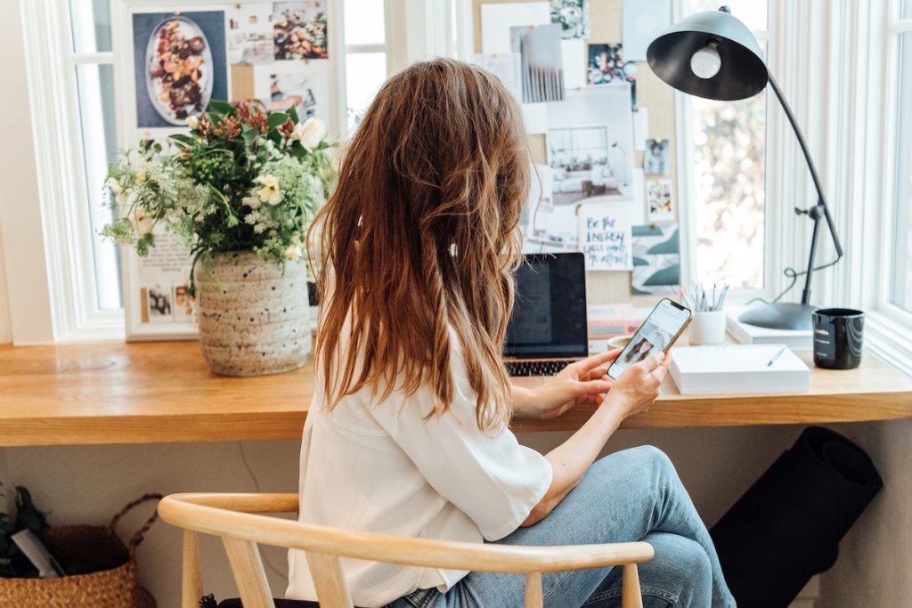 camille styles at home office desk, phone, workspace