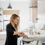 Woman cooking at stovetop