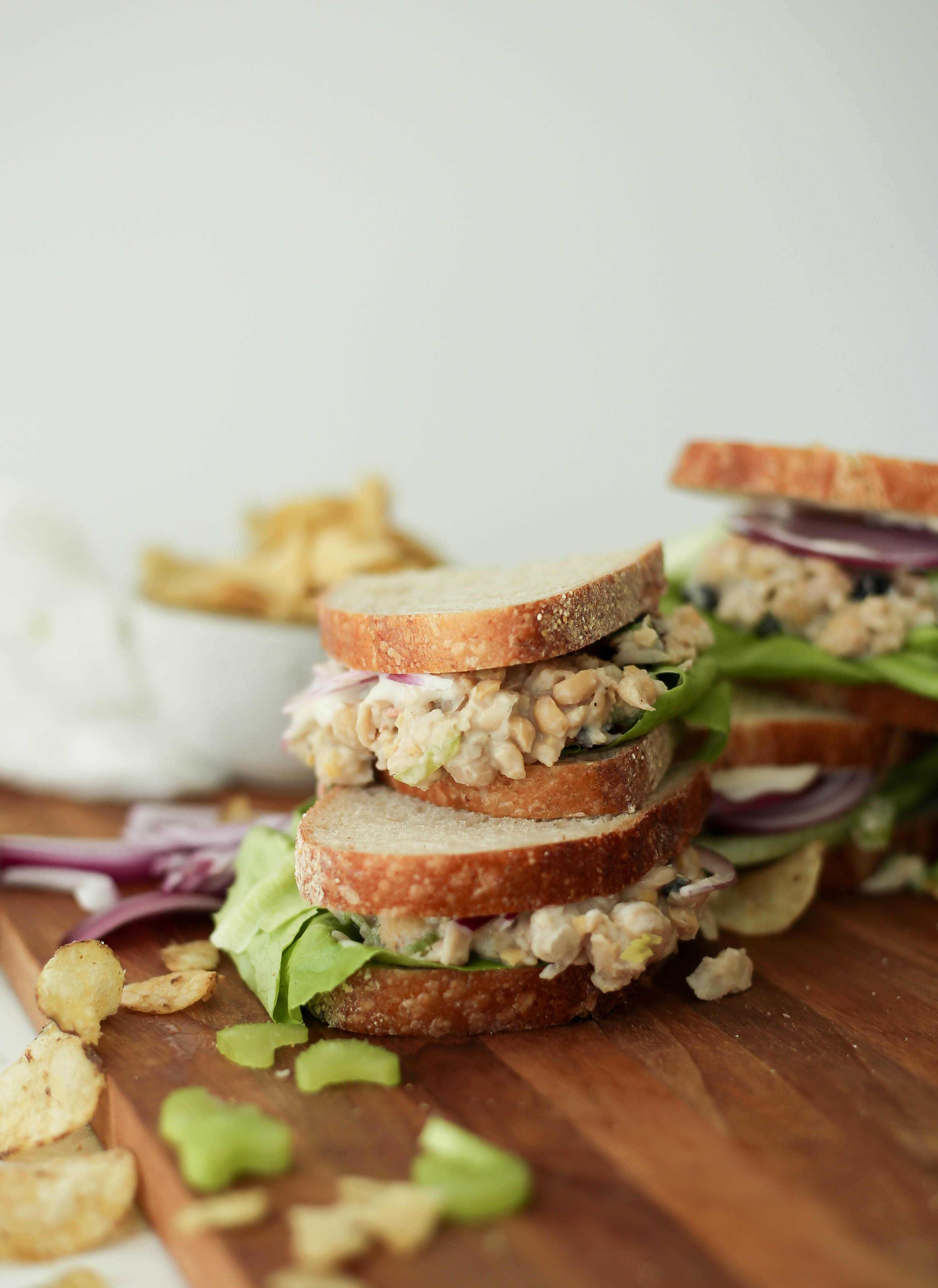 vegan chickpea salad sandwiches with cannellini beans, celery, and cranberries