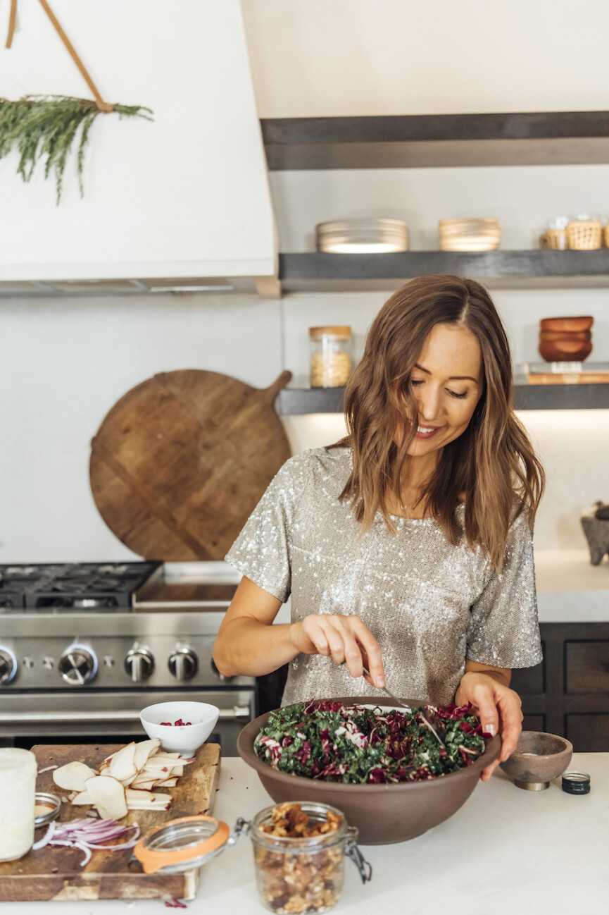 camille making salad in kitchen, meal prep, winter ingredients