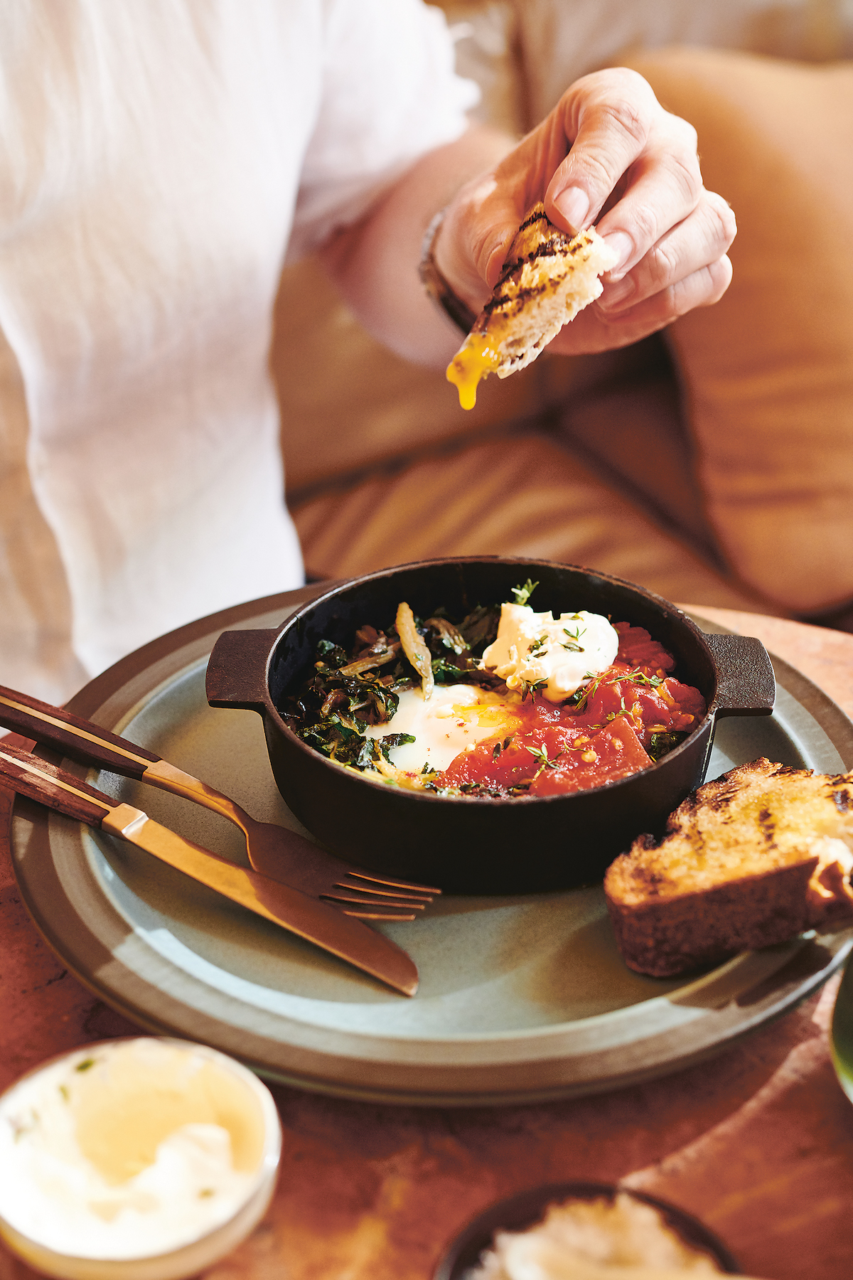 Baked green eggs with roast tomato and chilli salsa