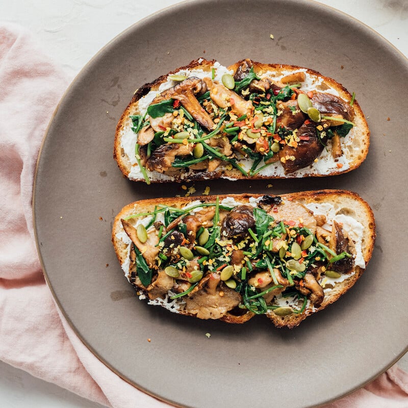mushroom toast with arugula and lemon--healthy plant-based breakfast recipe ideas