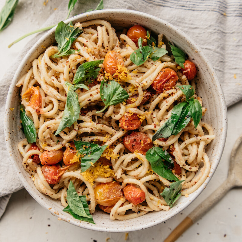 creamy one-pot vegan pasta with roasted tomatoes and basil, easy plant-based dinner