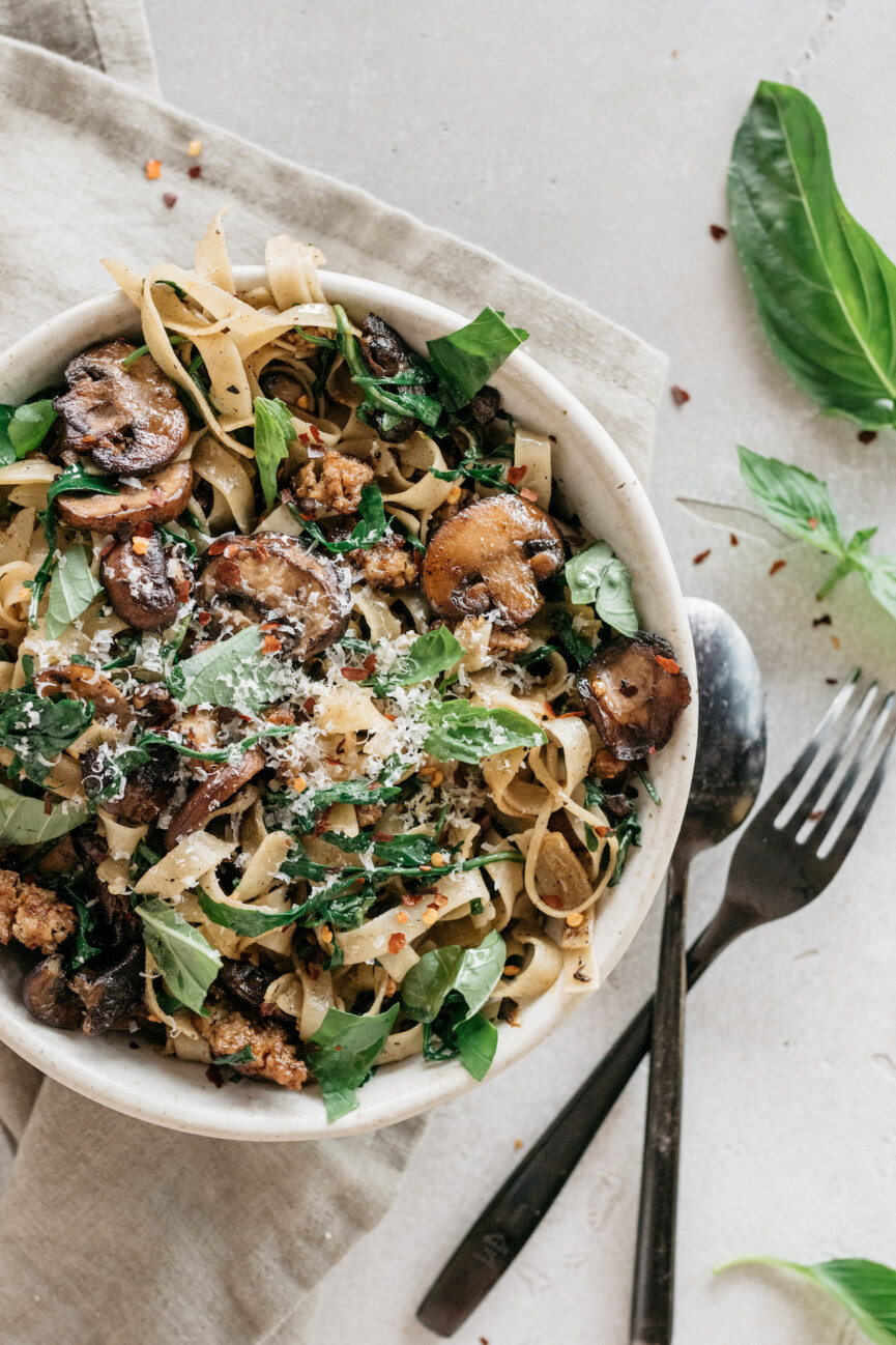 one pot sausage pasta recipe with mushrooms, and arugula