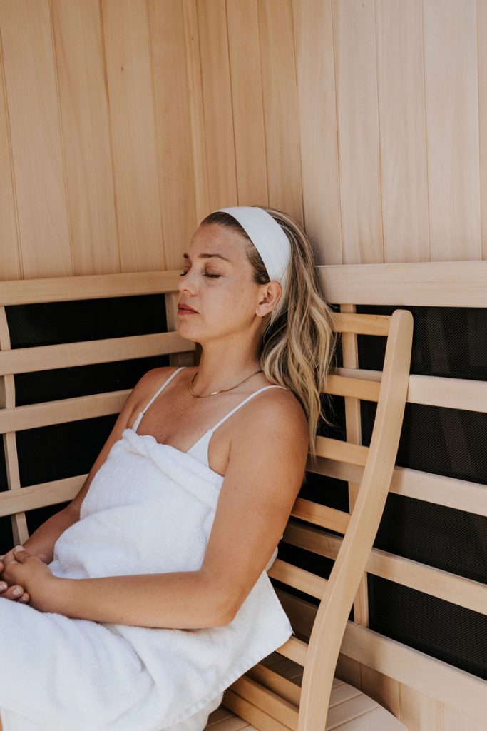 Janessa Leoné in her at-home sauna_best anti-aging essential oils