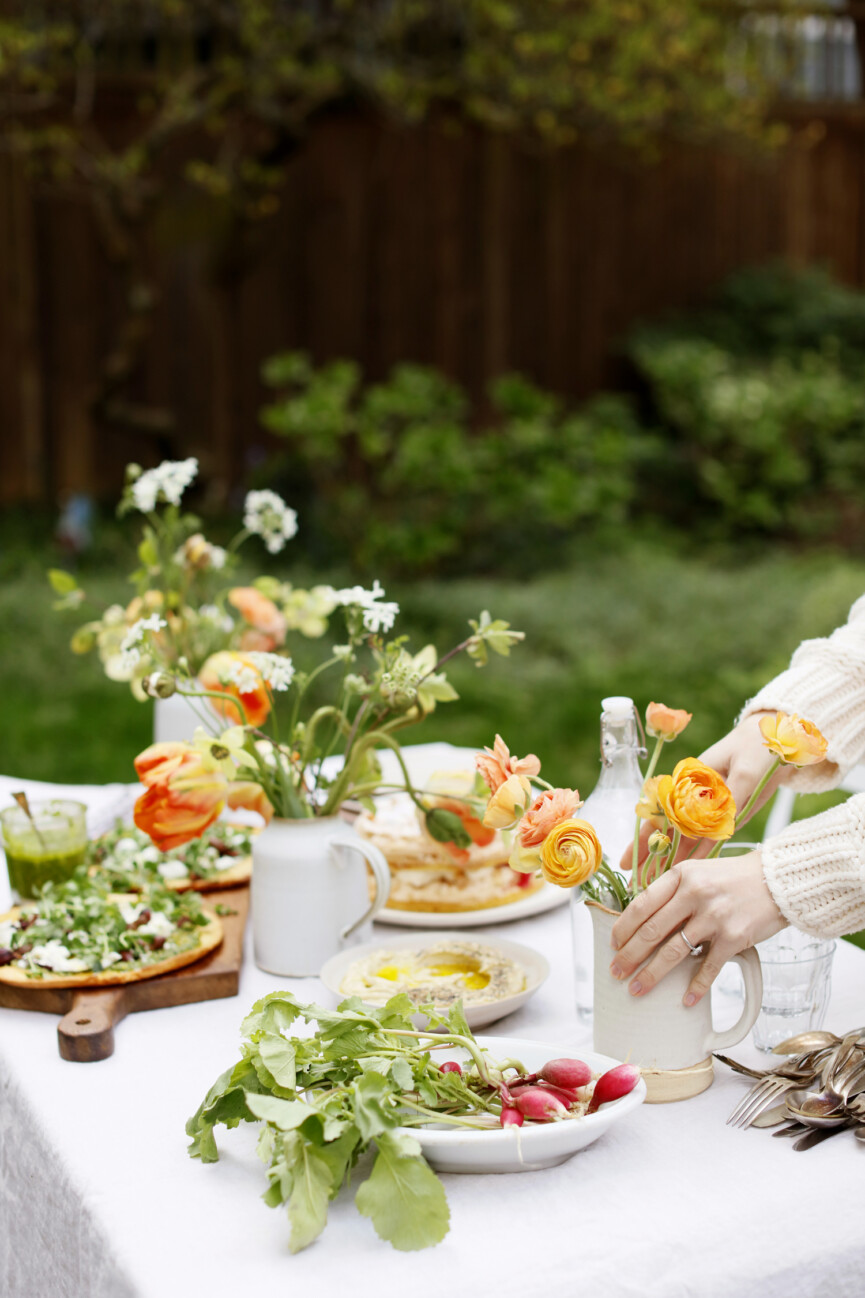 spring tablesetting for an outdoor party, flowers, tulips