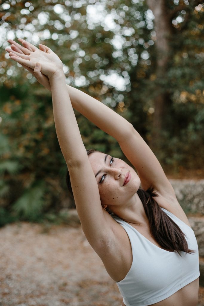 woman glowing skin stretching