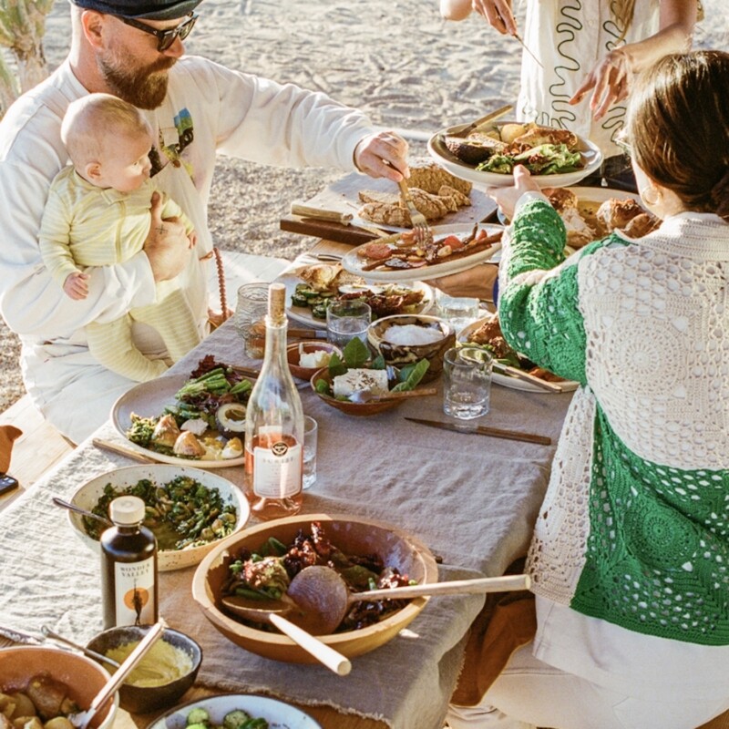 People eating dinner outside.