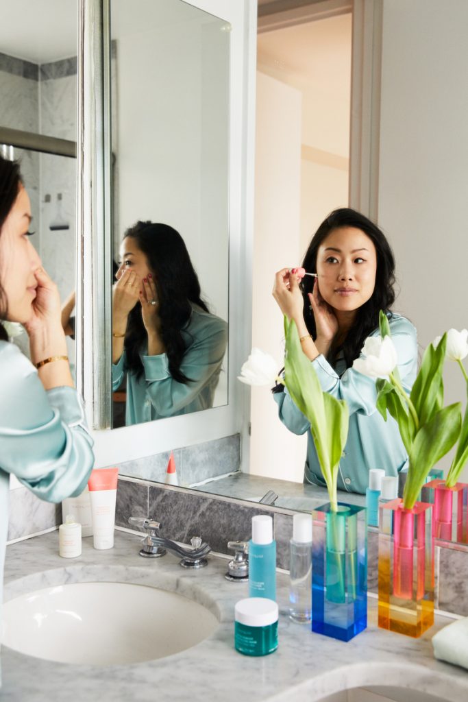 Alicia Yoon applying skincare_best moisturizers for dry skin