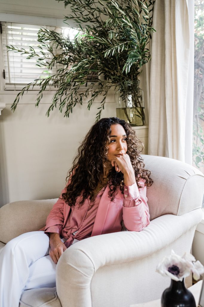 Simone Boyce sitting in living room_embrace vulnerability