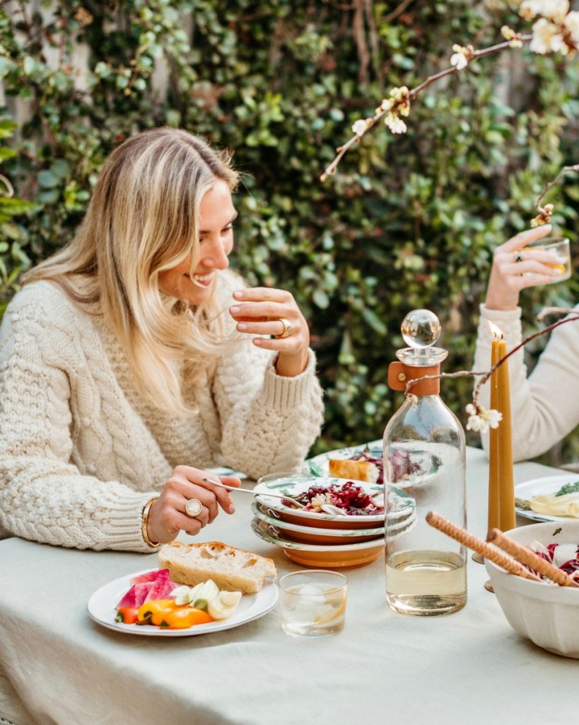olivia muniak smiling at fall dinner party_things to do in fall with families