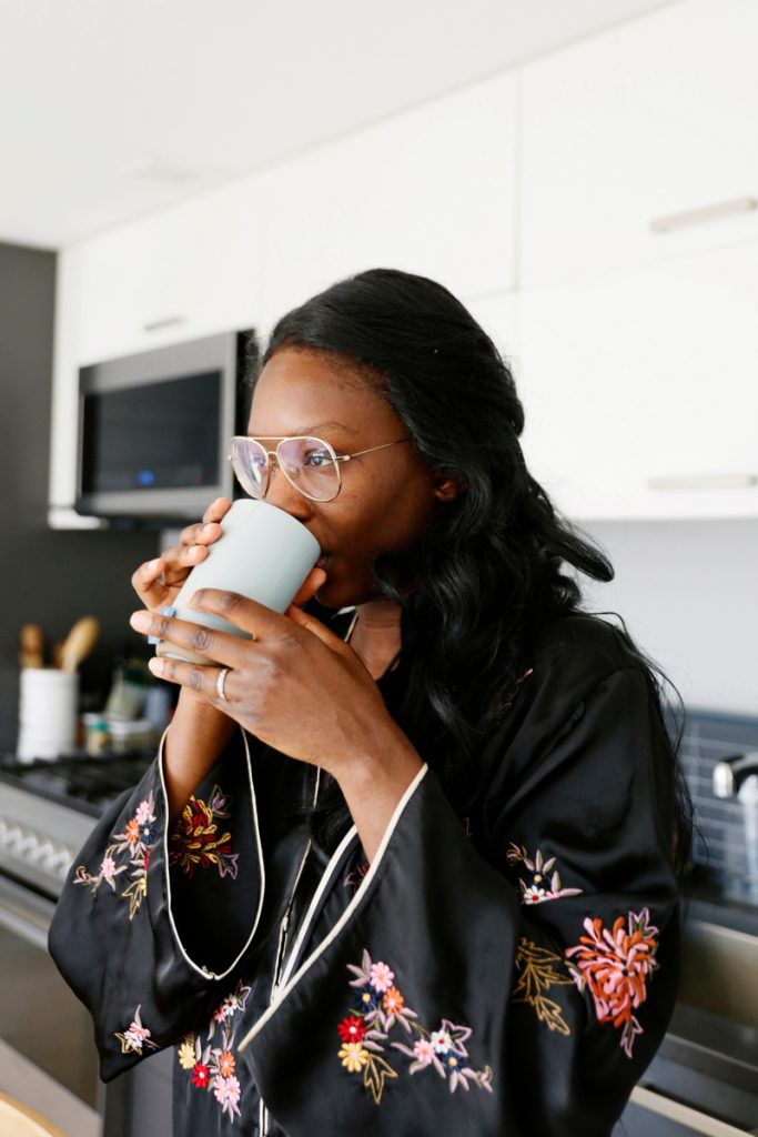 Marie Kouadio Amouzame drinking coffee