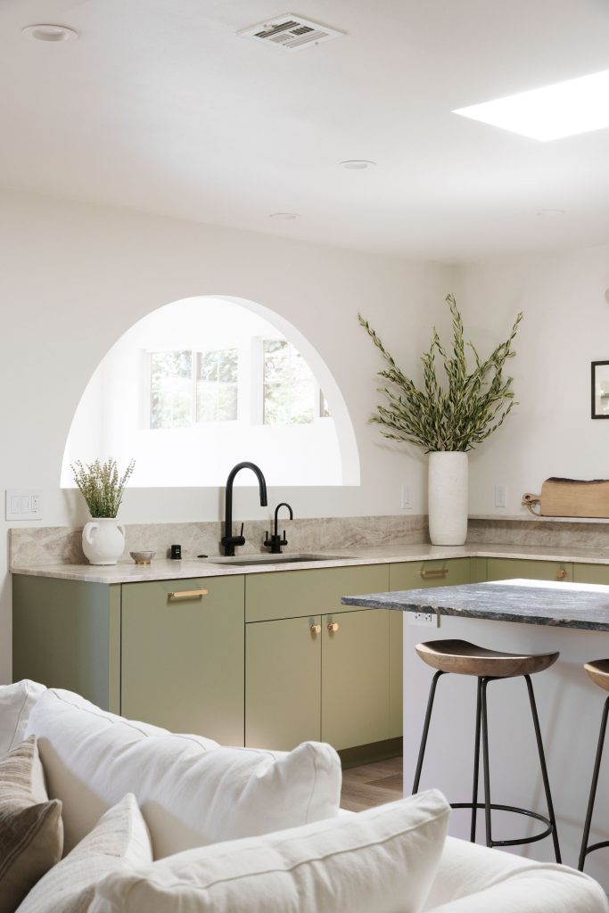 serene green kitchen with plants_winter décor trends 2022