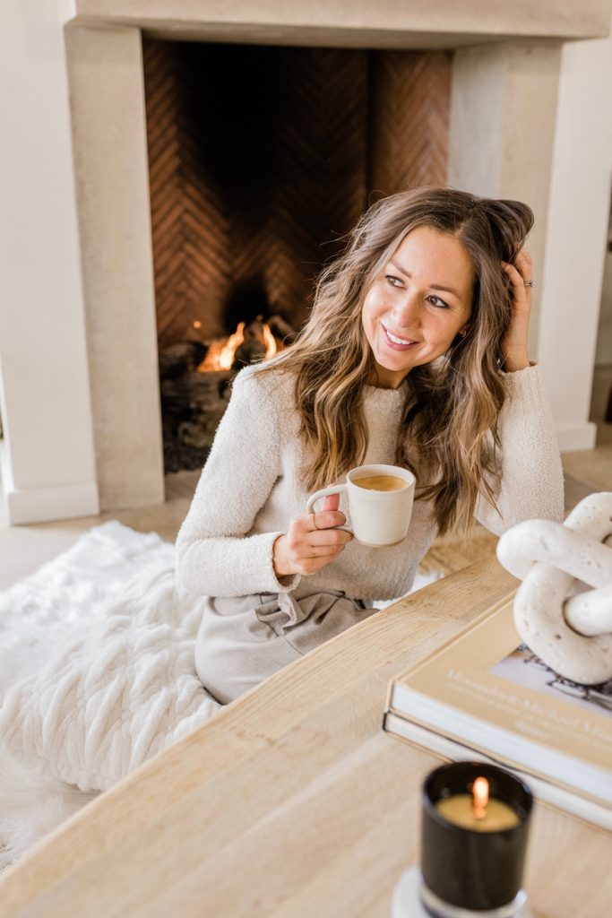 Camille Styles drinking tea by fire_drinks that boost immune system