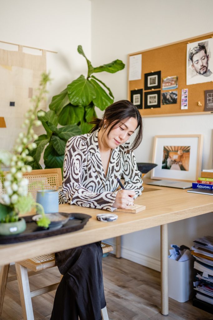 Diana Ryu writing a letter at desk_what to do on a Sunday night