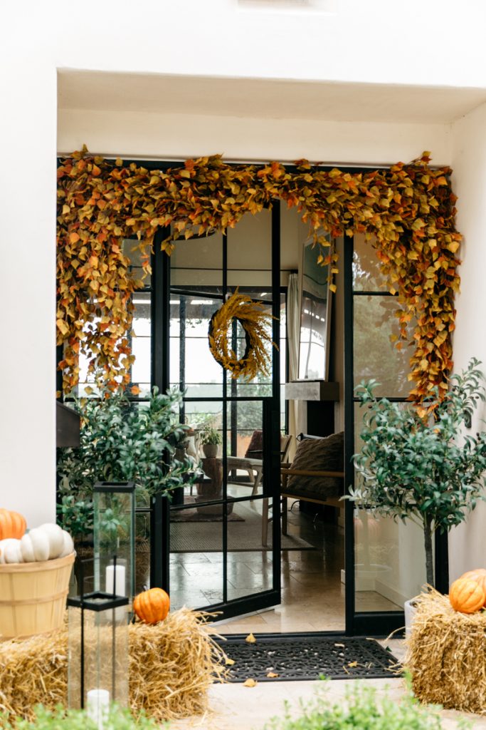 Camille Styles Halloween décor front door_how to approach Halloween candy with kids