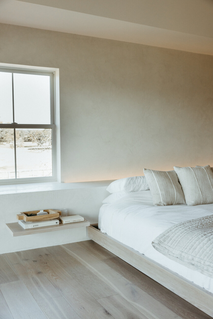 Minimalist bedroom painted in calming bedroom colors.