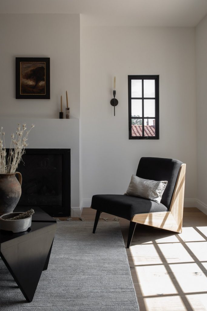 White and black living room with black accent chair