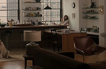 Keira Knightly sits in her New York apartment in Last Night.
