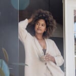 Woman relaxing outside in loungewear.