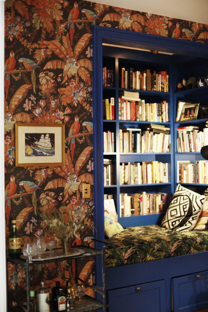 Blue home library with books.