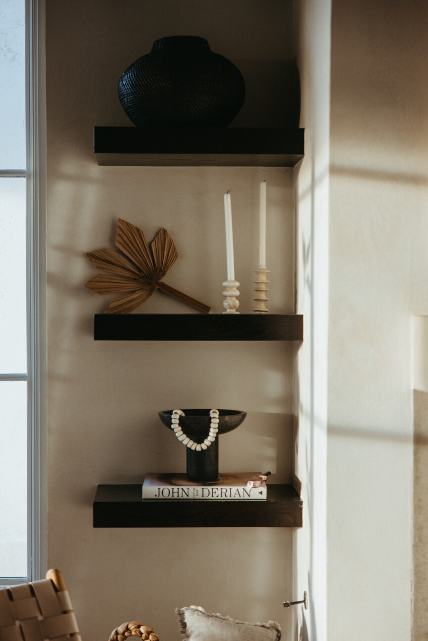 moody living room shelves, morning