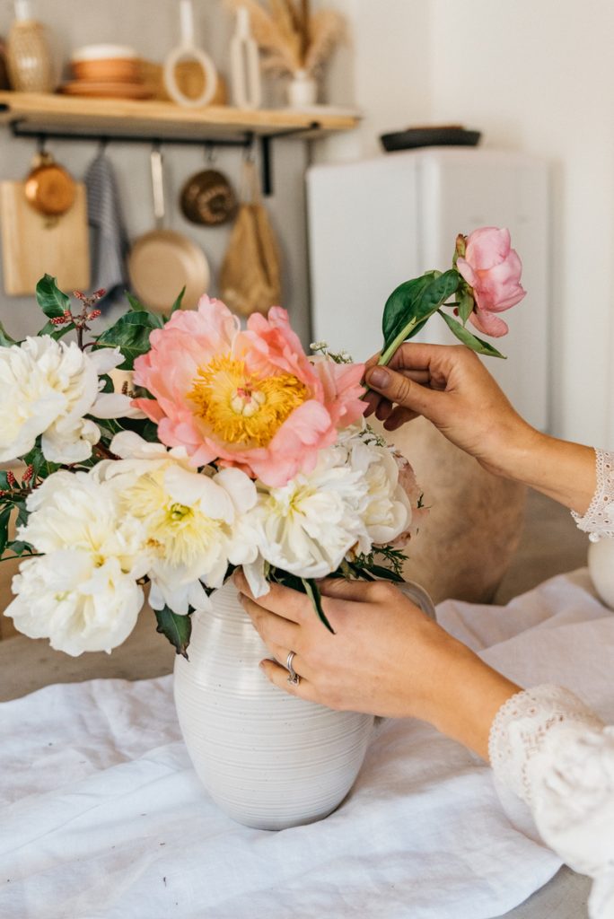 arranging flowers