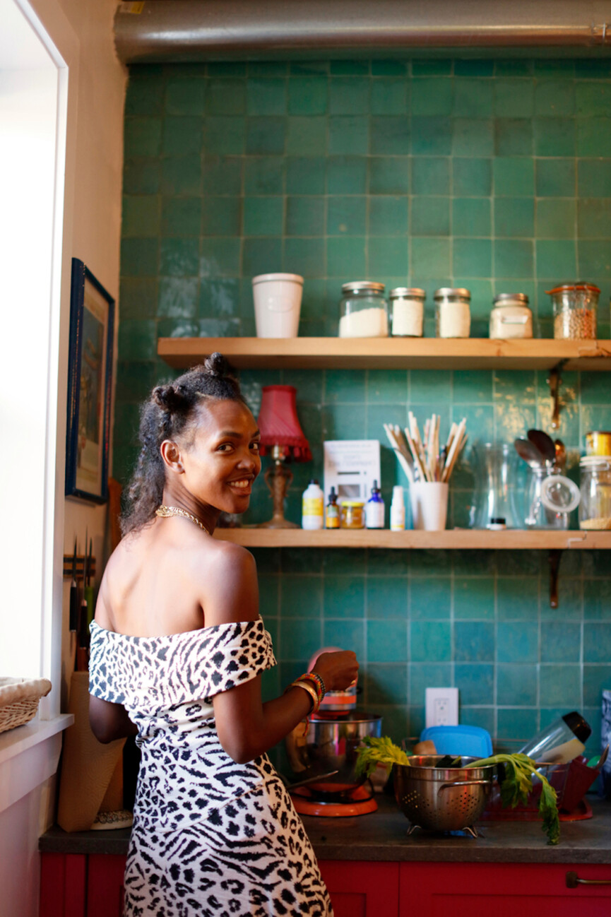 Woman cooking in kitchen.