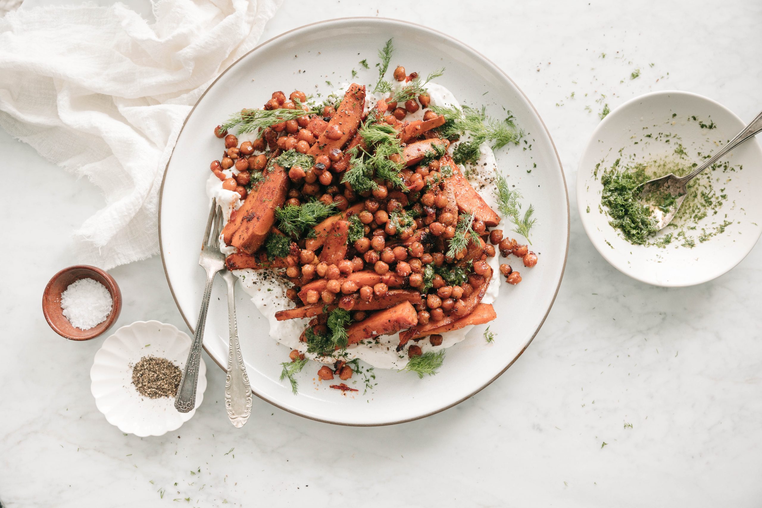 sweet potato chickpea bowl with feta yogurt and herbs
