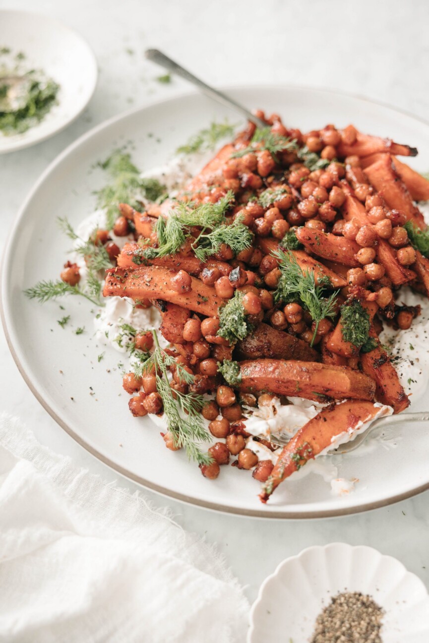 sweet potato chickpea bowl with feta yogurt and herbs