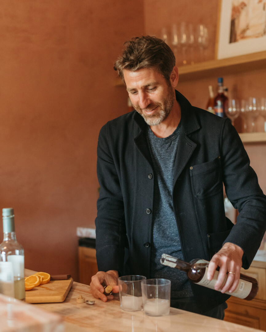 Man making drink for Father's Day gift guide.