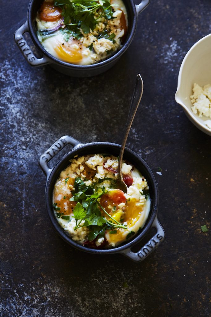 baked eggs with heirloom tomatoes, herbs, and feta.