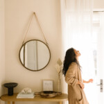 woman looking out window_luteal phase