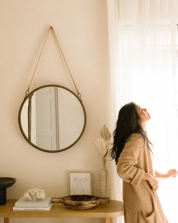 woman looking out window_luteal phase