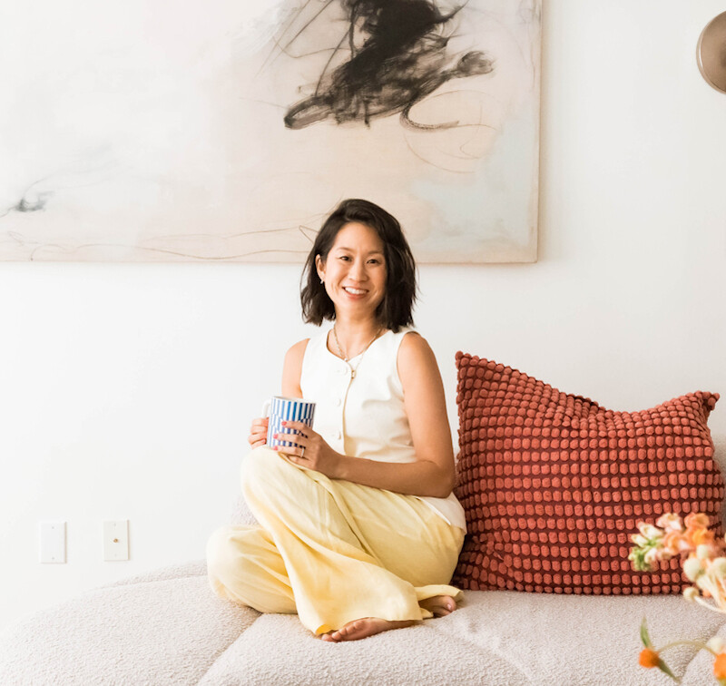 Eunice Byun in living room in New York City apartment.