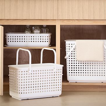 Stackable plastic baskets.