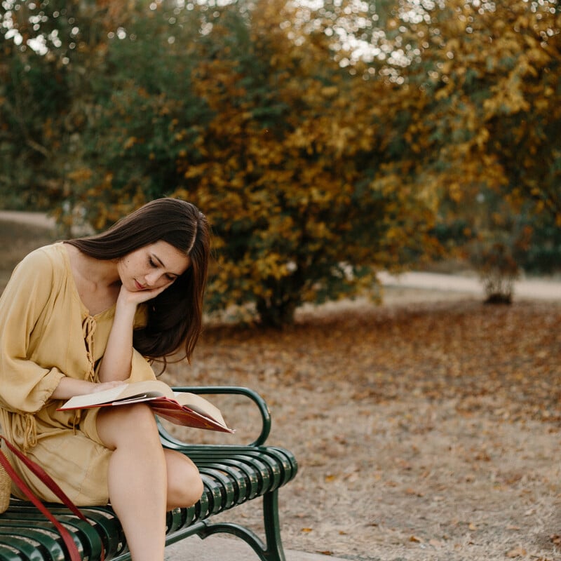 Woman reading outside.