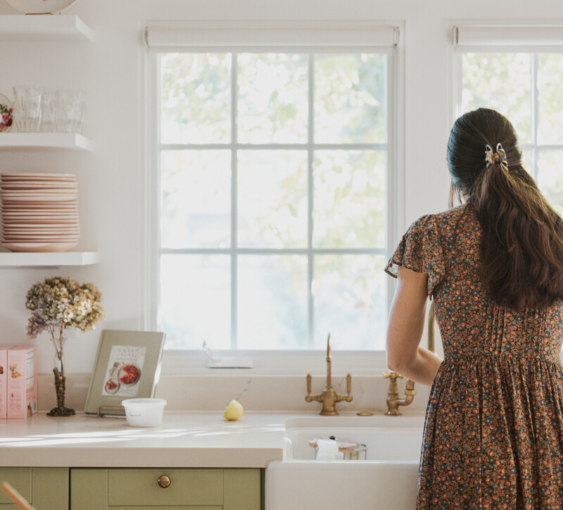 sweet laurel founder in kitchen, hostess gift guide