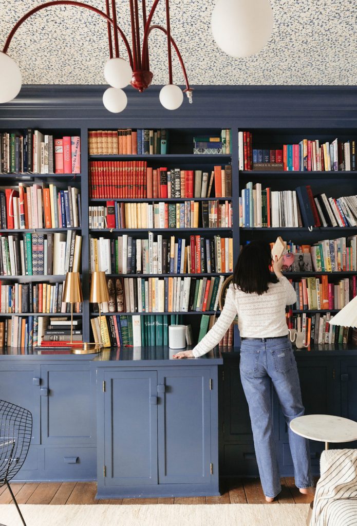 Jewel tone bookshelf fall 2023 paint color trends.